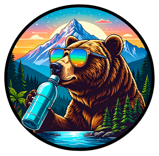 3-inch round sticker of a bear wearing sunglasses and holding a bottle in a mountainous landscape